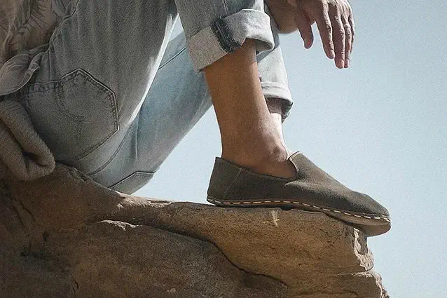 Woman wearing earthing shoes for earthing