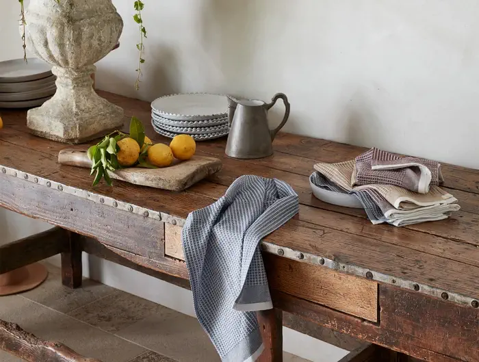 Organic non toxic kitchen towels on a wooden kitchen table